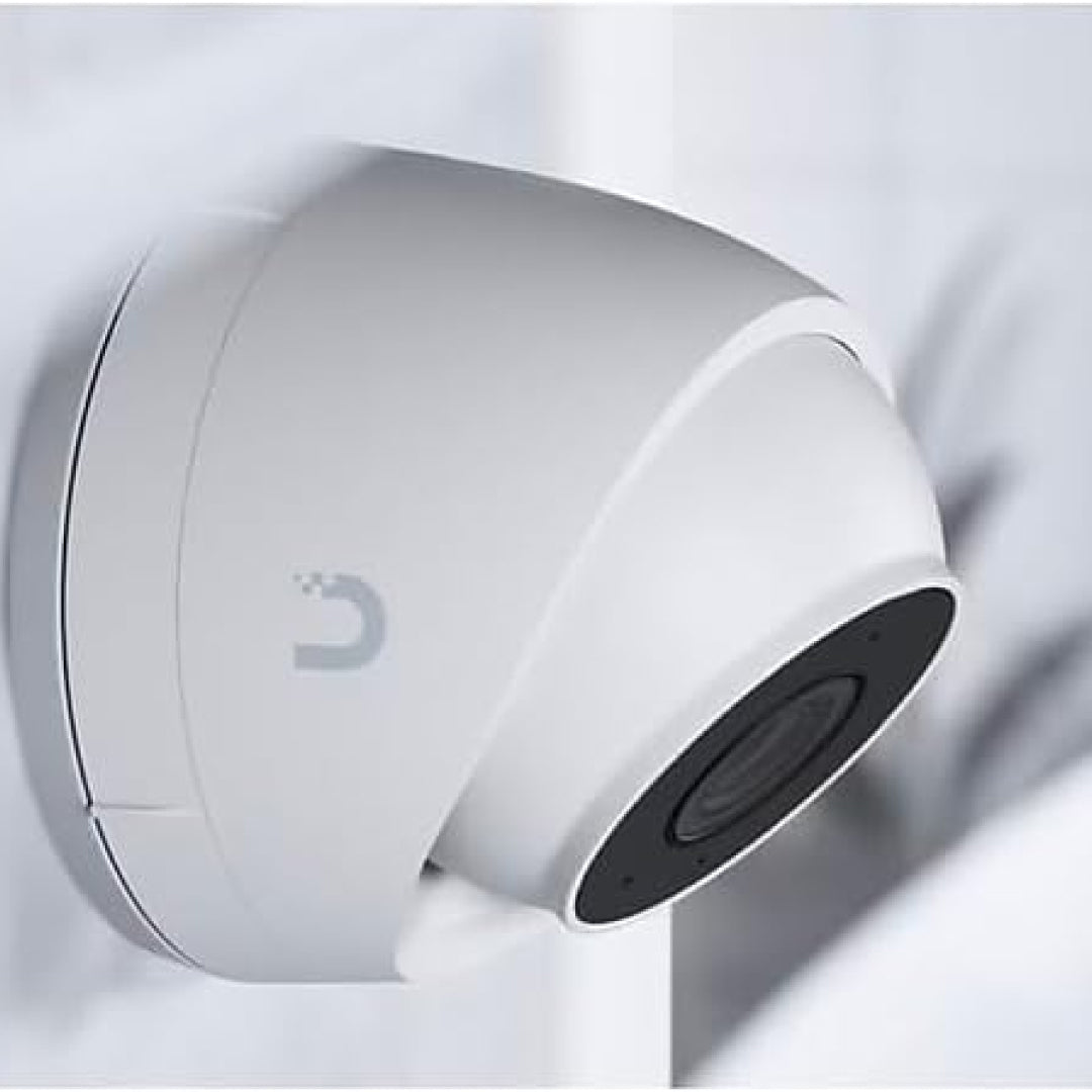 Ubiquiti G5 Turret Ultra Security Camera mounted on the wall, compact dome design with wide-angle lens for indoor and outdoor surveillance.