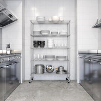 Kitchen storage metal wire shelving unit holding dishes and cookware.