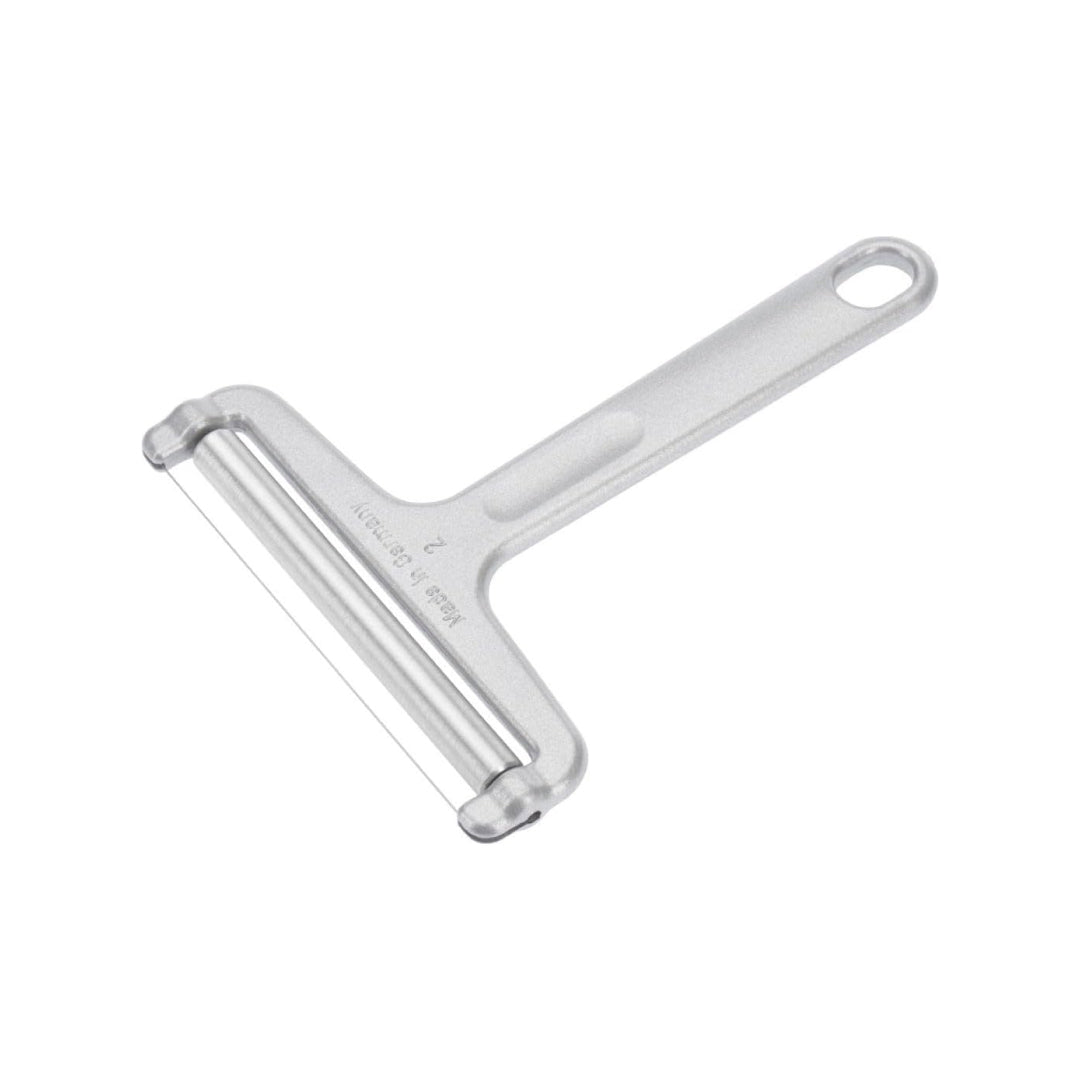 Side angle view of Westmark cheese slicer with metal handle and wire cutter