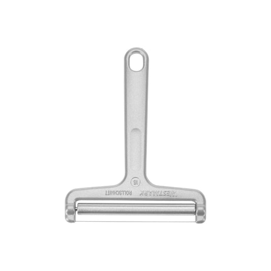 Westmark Germany stainless steel wire cheese slicer placed on a block of cheese with grapes and tomatoes, showing sharp cutting precision and ergonomic handle design.